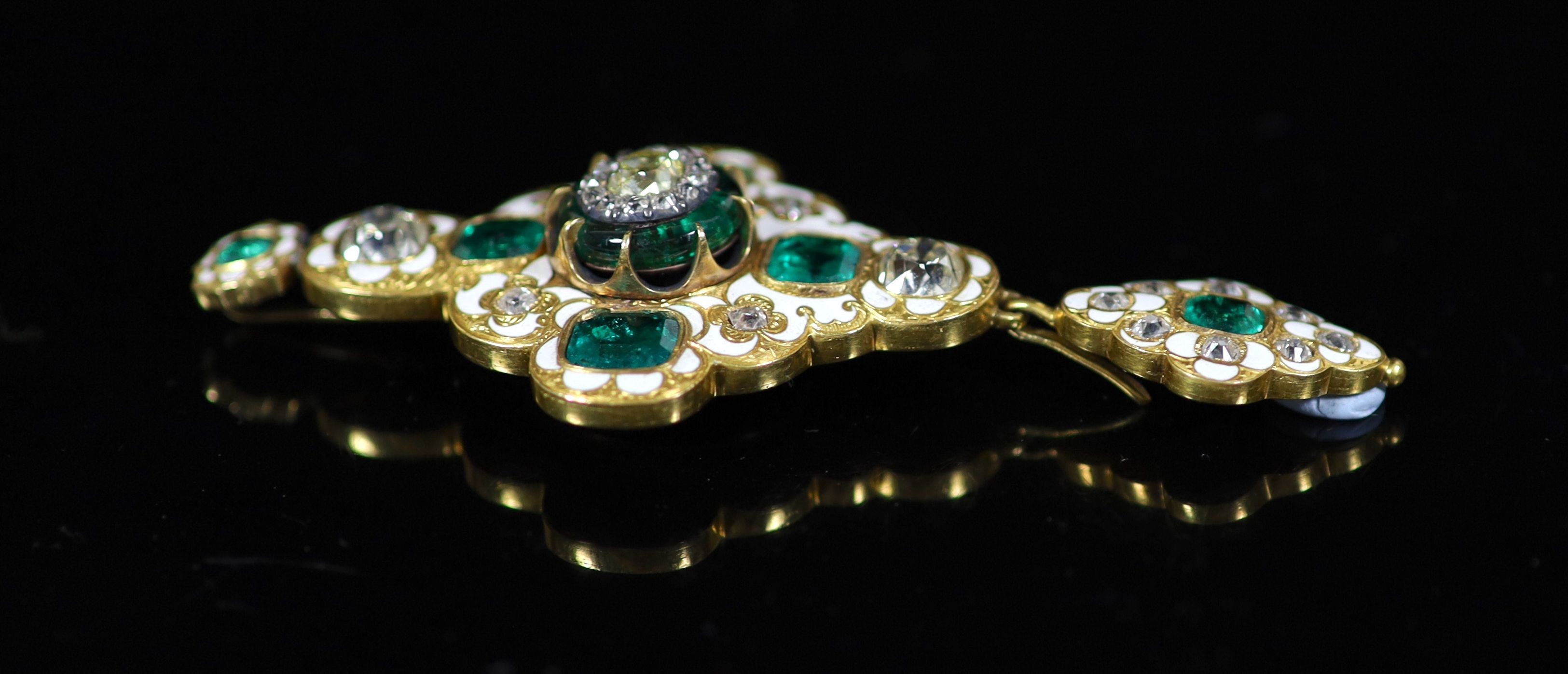 A good Victorian gold, white enamel, emerald and diamond drop pendant